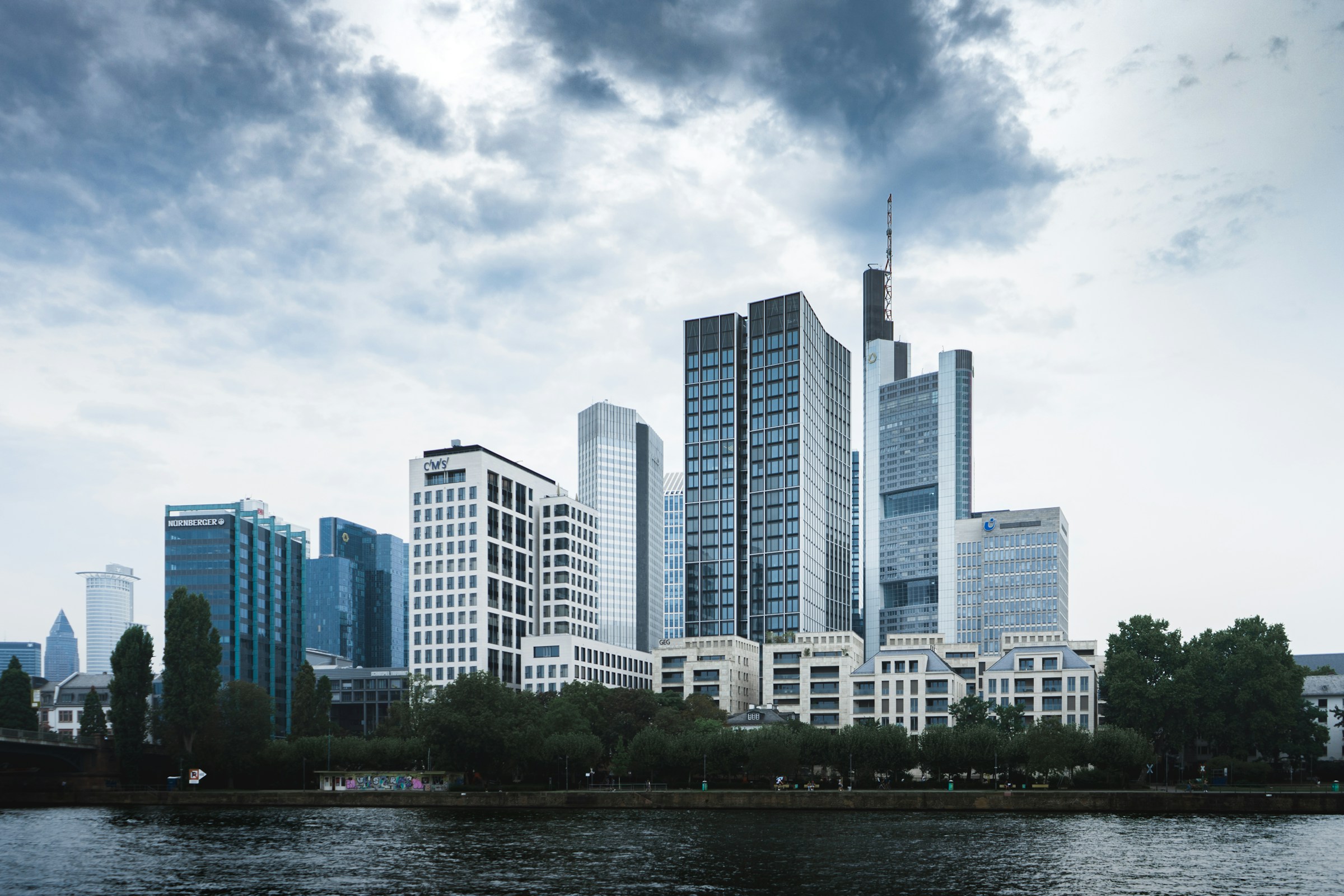Frankfurt skyline across the Main, representing a Germany-based European consulting perspective